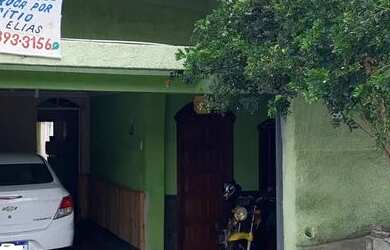 Imagem: A casa possui 3 Dormitórios, 2 Banheiros, 3 Vagas na garagem