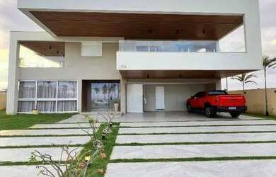 Imagem: A casa em condomínio possui 5 Dormitórios, 5 Banheiros, 5