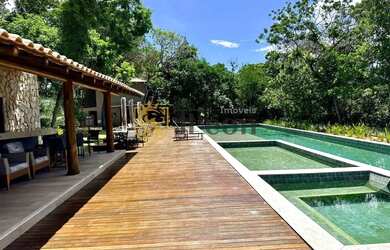 Imagem: A casa possui 3 Dormitórios, 2 Banheiros, 4 Vagas na garagem