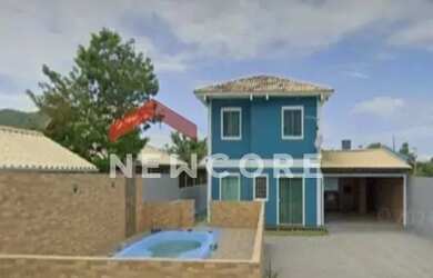 Imagem: A casa possui 3 Dormitórios, 3 Banheiros, 2 Vagas na garagem