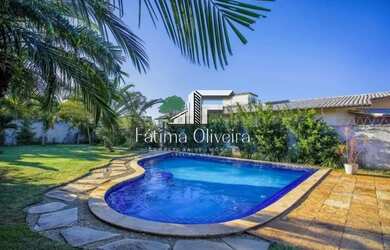 Imagem: A casa possui 4 Dormitórios, 5 Banheiros, 5 Vagas na garagem