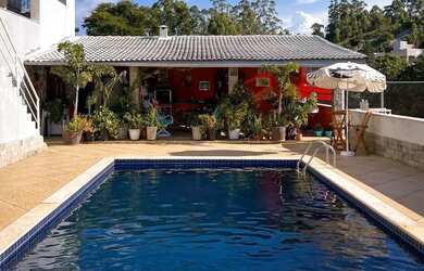 Imagem: A casa em condomínio possui 3 Dormitórios, 4 Banheiros, 4