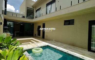 Imagem: A casa possui 3 Dormitórios, 4 Banheiros, 2 Vagas na garagem