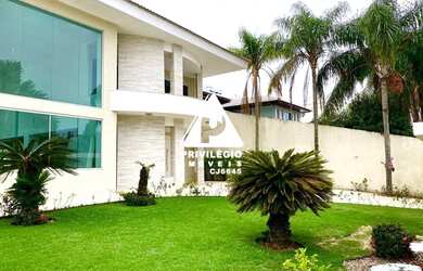 Imagem: A casa em condomínio possui 5 Dormitórios, 5 Banheiros, 5