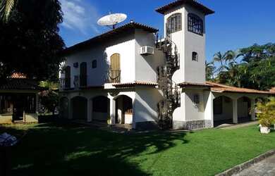 Imagem: A casa em condomínio possui 5 Dormitórios e está localizado