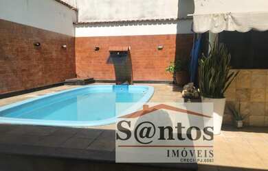 Imagem: A casa possui 3 Dormitórios, 3 Banheiros, 2 Vagas na garagem