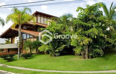 Imagem: A casa em condomínio possui 3 Dormitórios, 5 Banheiros e 500m²