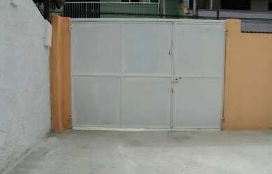 Imagem: A casa em condomínio possui 4 Vagas na garagem e está localizado