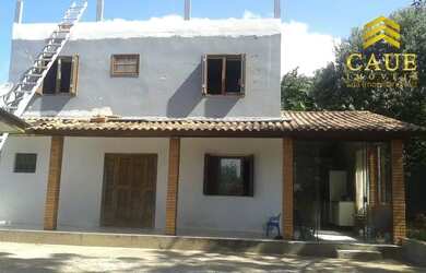 Imagem: A casa em condomínio possui 4 Dormitórios, 3 Banheiros e 1145m²