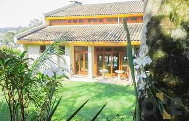 Imagem: A casa em condomínio possui 4 Dormitórios, 5 Banheiros, 4