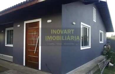 Imagem: A casa possui 2 Dormitórios, 1 Banheiro, 2 Vagas na garagem