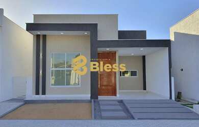 Imagem: A casa possui 3 Dormitórios, 2 Banheiros, 2 Vagas na garagem