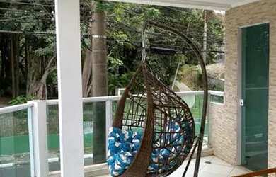 Imagem: A casa possui 4 Dormitórios, 5 Banheiros, 3 Vagas na garagem