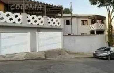 Imagem: A casa possui 4 Dormitórios, 2 Banheiros, 2 Vagas na garagem