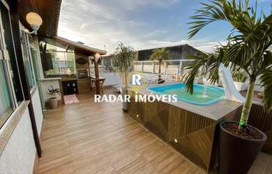 Imagem: A casa possui 4 Dormitórios, 5 Banheiros, 2 Vagas na garagem