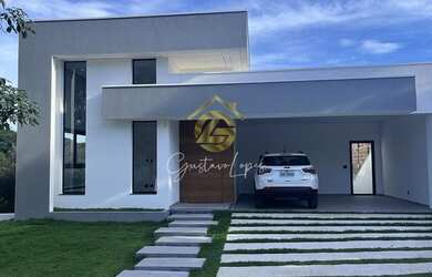 Imagem: A casa possui 3 Dormitórios, 3 Banheiros, 4 Vagas na garagem