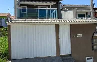 Imagem: A casa possui 3 Dormitórios, 4 Banheiros, 2 Vagas na garagem