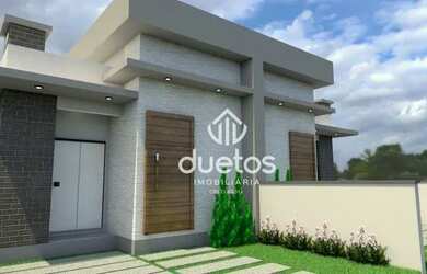 Imagem: A casa possui 3 Dormitórios, 2 Banheiros, 1 Vaga na garagem