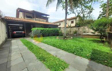 Imagem: A casa possui 3 Dormitórios, 5 Banheiros, 5 Vagas na garagem