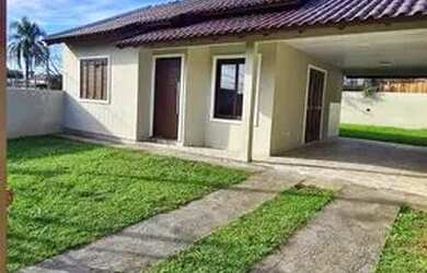 Imagem: A casa possui 2 Dormitórios, 2 Banheiros, 2 Vagas na garagem