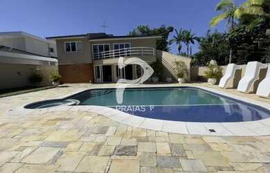 Imagem: A casa em condomínio possui 5 Dormitórios, 5 Banheiros, 4