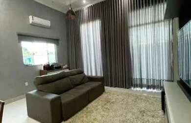 Imagem: A casa possui 3 Dormitórios, 2 Banheiros, 2 Vagas na garagem