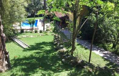 Imagem: A casa em condomínio possui 4 Dormitórios, 4 Banheiros, 2