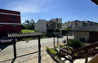 Imagem: A casa possui 3 Dormitórios, 2 Banheiros, 4 Vagas na garagem