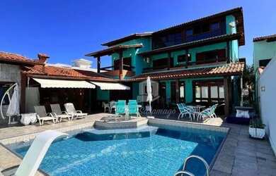 Imagem: A casa possui 5 Dormitórios, 4 Banheiros, 3 Vagas na garagem