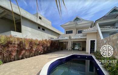 Imagem: A casa em condomínio possui 5 Dormitórios, 5 Banheiros, 4