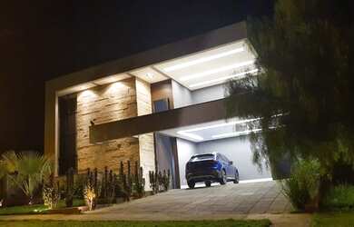 Imagem: A casa em condomínio possui 3 Dormitórios e está localizado