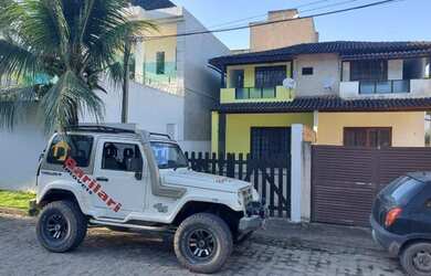 Imagem: A casa possui 2 Dormitórios, 1 Banheiro, 2 Vagas na garagem