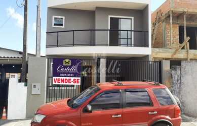 Imagem: A casa possui 3 Dormitórios, 2 Banheiros, 2 Vagas na garagem