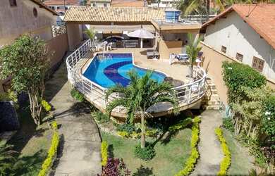 Imagem: A casa possui 4 Dormitórios, 4 Banheiros, 2 Vagas na garagem