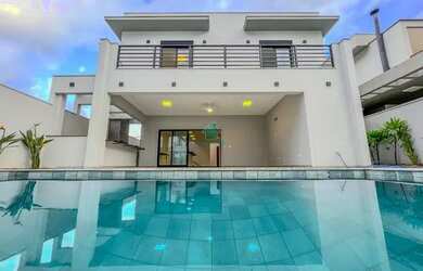 Imagem: A casa em condomínio possui 4 Dormitórios, 5 Banheiros, 4