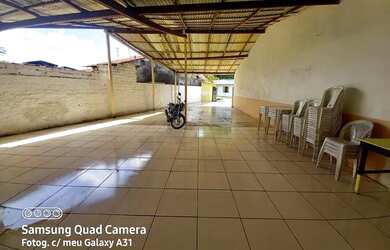 Imagem: A casa possui 2 Dormitórios, 3 Banheiros, 4 Vagas na garagem