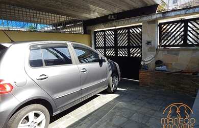 Imagem: A casa possui 3 Dormitórios, 1 Banheiro, 1 Vaga na garagem