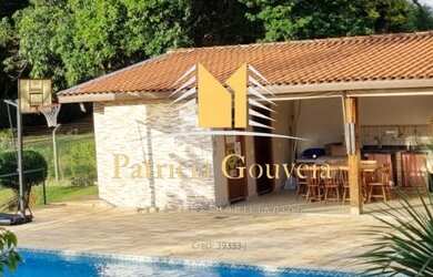 Imagem: A casa em condomínio possui 4 Dormitórios, 5 Banheiros, 5