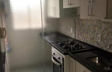 Imagem: O apartamento possui 2 Dormitórios, 1 Banheiro, 1 Vaga na garagem