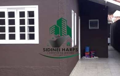 Imagem: A casa possui 2 Dormitórios, 1 Banheiro, 3 Vagas na garagem