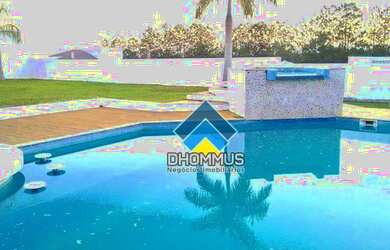 Imagem: A casa em condomínio possui 4 Dormitórios, 5 Banheiros, 5