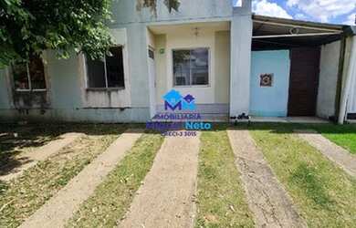 Imagem: A casa possui 2 Dormitórios, 1 Banheiro, 2 Vagas na garagem