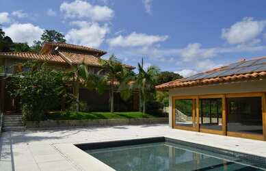 Imagem: A casa em condomínio possui 4 Dormitórios, 5 Banheiros, 5