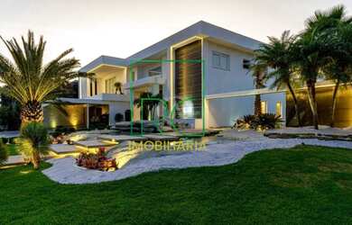 Imagem: A casa em condomínio possui 4 Dormitórios, 5 Banheiros, 4