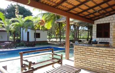 Imagem: A casa possui 5 Dormitórios, 5 Banheiros, 5 Vagas na garagem