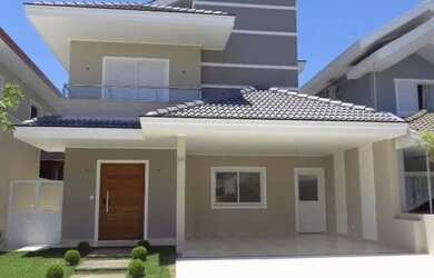 Imagem: A casa possui 3 Dormitórios, 2 Banheiros, 2 Vagas na garagem