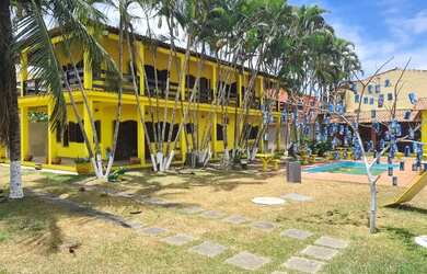 Imagem: A casa possui 4 Dormitórios, 4 Banheiros, 5 Vagas na garagem