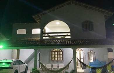 Imagem: A casa possui 4 Dormitórios, 4 Vagas na garagem e está localizado