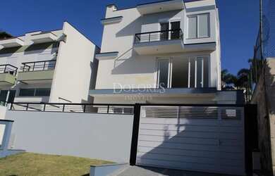 Imagem: A casa em condomínio possui 4 Dormitórios, 5 Banheiros, 4