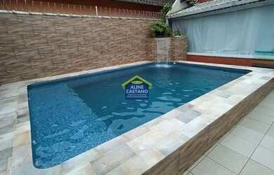 Imagem: A casa possui 4 Dormitórios, 2 Banheiros, 310m² de Área e